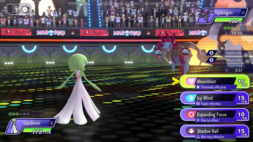 A Pokémon battle between Gardevoir and Hydreigon. The move Moonblast is selected, which is marked as extremely effective.